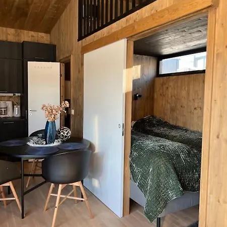 Attraktiv & Smart Funkishytte Pa Nes Strandhager. Holiday home Arnes (Nes)