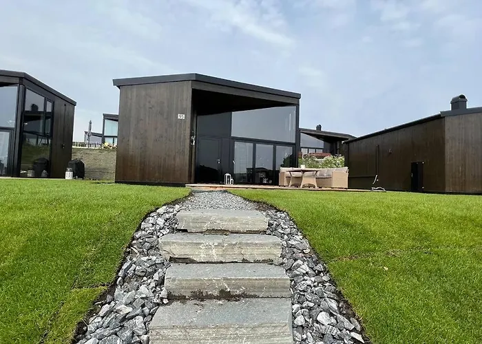 Attraktiv & Smart Funkishytte Pa Nes Strandhager. Casa vacanze